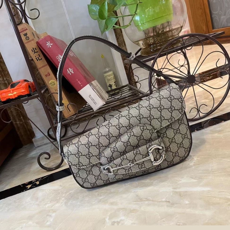 G*u*i top handle bags
